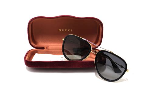 gucci gg0062s black and gold|Gucci hologram sunglasses.